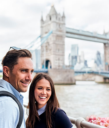 couple in front of Tower Bridge